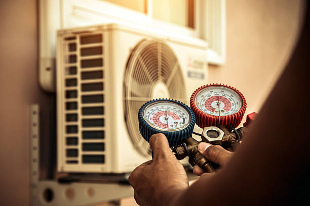 Professional Heat Pump Repair technician working in Dike, IA